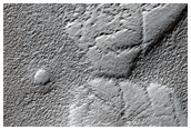 Northwest Hellas Basin Landforms