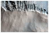 Fresh Unnamed Crater with Ponded Pitted Materials