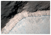 Very Distinctive Dark Layer in Crater Walls in Terra Cimmeria