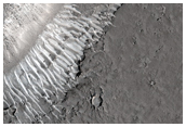 Ring and Cone Structures in Grjota Valles
