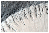 3-Kilometer Diameter Crater with Good Bedrock Exposures in Upper Walls