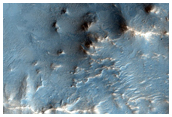 Well-Preserved 15-Kilometer Diameter Crater Near Nili Fossae