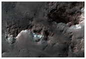 Light-Toned Rock in Central Peak of Alga Crater
