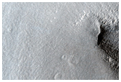 Relatively Youthful Crater in Mid-Latitude Apron Material