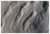 Crater with Multiple Gully Orientations