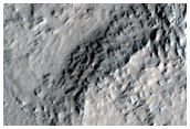 Western Rim and Ejecta of Largest Rayed Crater Known on Mars
