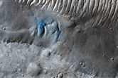 Bright Halo Pits Seen in MOC Image E11-01762