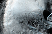 Ejecta within Small Pre-Existing Crater in Hesperia Planum