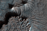 Light-Toned Layered Rock Outcrops in Southern Mid-Latitude Crater