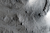 Fresh Impact Crater with a Gullied Central Peak