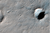 Very Recent Small Crater in Dejnev Crater