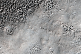 Channels on Ejecta Blanket of Impact Crater