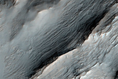 Layering in Eastern Central Peak of Oudemans Crater