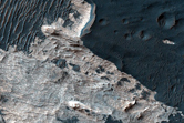 Alluvial Fan and Bright Layers on Floor of Coprates Chasma