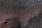 Layer Exposures in Intermountain Valleys West of Argyre Planitia