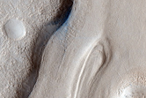 Crevasse-Like Features in Valley Floor Flows