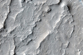 Warped and Eroded Terrain in Western Elysium Planitia