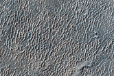 Light-Toned Circular Feature in South Sinus Meridiani Cratered Terrain