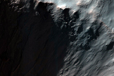 Gully Channel Cutting Crater on Larger Crater Wall in MOC Image S16-00615