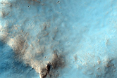 Well-Preserved Equatorial Crater with Central Peak and Wall Slumps