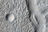 Channels on Cerulli Crater Ejecta