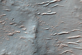 Isolated Gully at Intersection of Wrinkle Ridge and Crater Wall