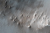 Crater with Lobate Ejecta in Noctis Labyrinthus