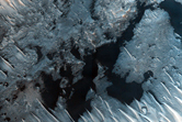 Dark Dunes over Light-Toned Mega-Ripples Seen in MOC Image SP1-26004