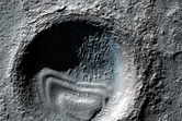 Small Crater with Interior Deposits As Seen in MOC Image M0401430