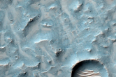 Eroded and Well-Exposed Ponded and Pitted Material on Crater Floor