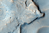 Light-Toned Rock and Scarps in MOC Images R10-03225 and R16-01292