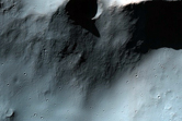 Unusual Double Crater with Well-Preserved Ejecta
