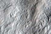 Ejecta from Unnamed Crater Near Hrad Vallis