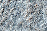 Crater in Etched Terrain of Meridiani Region