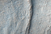 Concentric Ridges Near Alcoves Northwest of Oudemans Crater