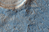 Impact Crater Amid the Deuteronilus Mensae