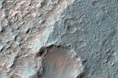 Olivine-Rich Deposits Off of the Ladon Impact Basin