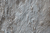 Pits in Distal Lava From Arsia Mons South Flank