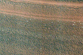 Layered Deposits and Unconformities in Western Gemini Scopuli
