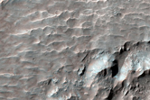 Central Structure of Crater with Bedrock Exposures of Diverse Composition