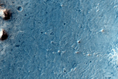 Layered Sediments Filling Crater in Northwest Meridiani Region
