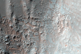 Well-Preserved Crater in Ladon Basin
