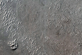 Transition between Medusae Fossae Formation and Clusters of Aligned Cones
