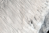 Western Rim and Ejecta of Very Young 12-Kilometer Diameter Crater