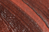 Exposure of Polar Layered Deposits on Ridges and Troughs