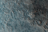 Crater in Mamers Valles Region