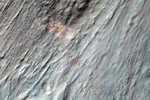 Coprates Chasma Layers and Flow Forms Seen in MOC Image R23-01363