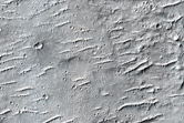 Layered Material on Uplands South of Aeolis Planum