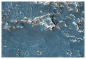 Yardangs and Lava Flows Southeast of Arsia Region