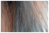 New Boulder Tracks Formed between MOC Images R11-02300 and S01-00136